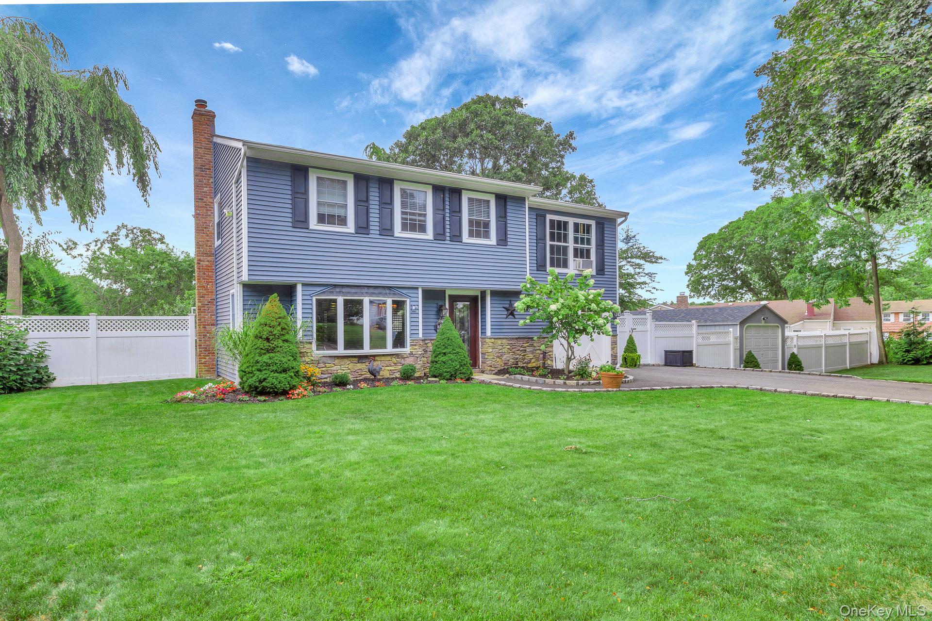 4 Ashford Drive, Ridge, NY 11961