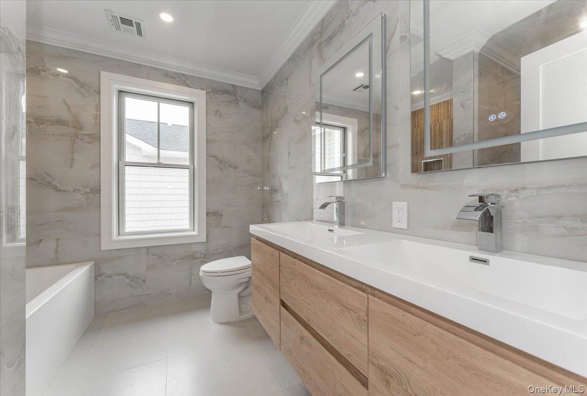 905 Greenfield Road, Woodmere, NY 11598