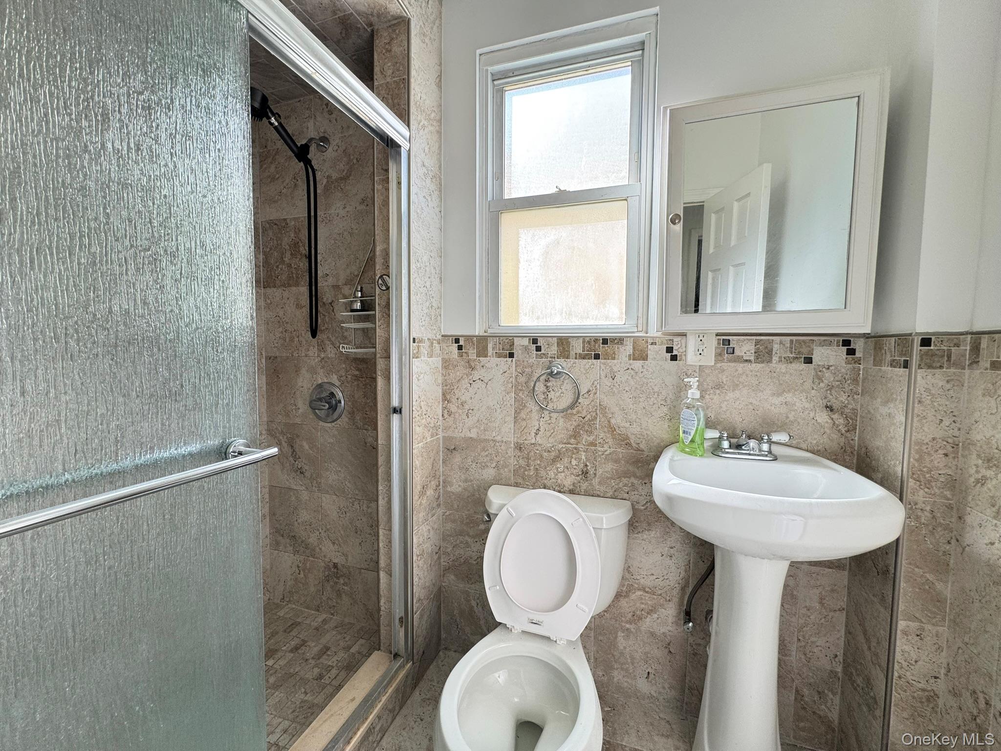 33-28 105th Street, Corona, NY 11368