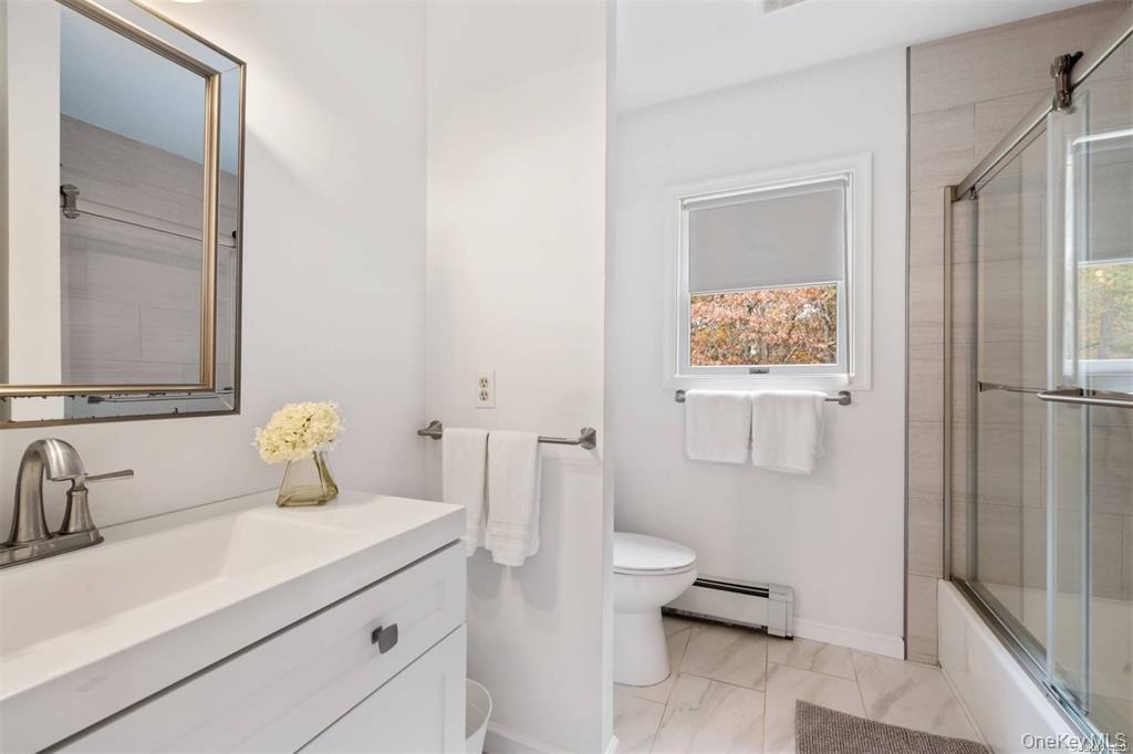 4 Wooded Lane, Hampton Bays, NY 11946