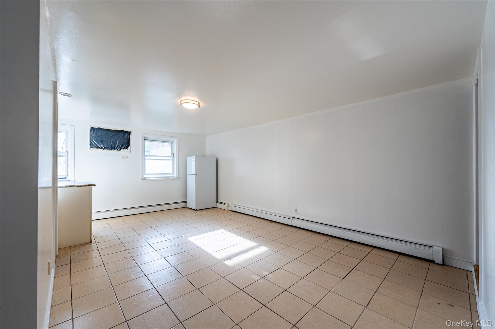 1027 Throggmorton Avenue, Bronx, NY 10465