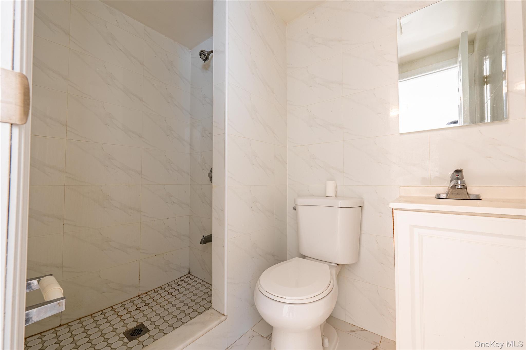 1027 Throggmorton Avenue, Bronx, NY 10465