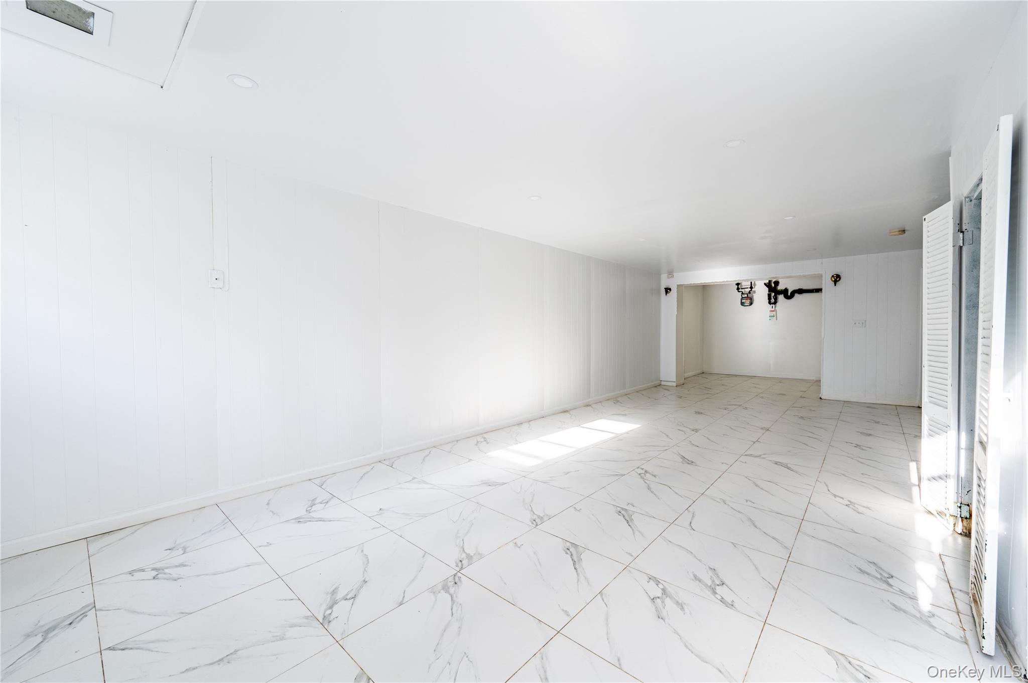 1027 Throggmorton Avenue, Bronx, NY 10465