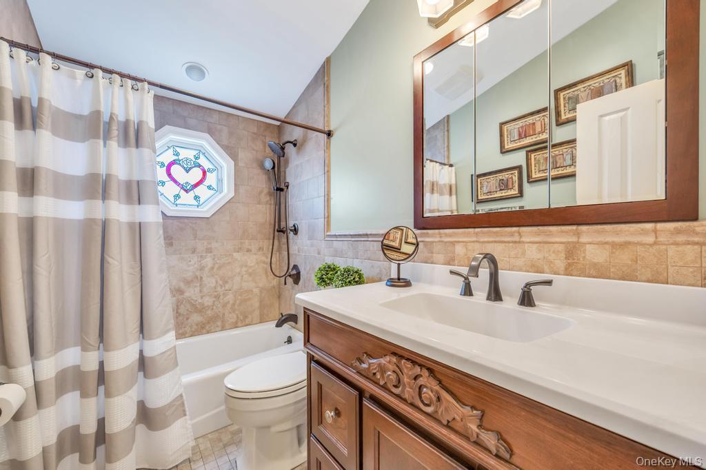 47 Choir Lane, Westbury, NY 11590