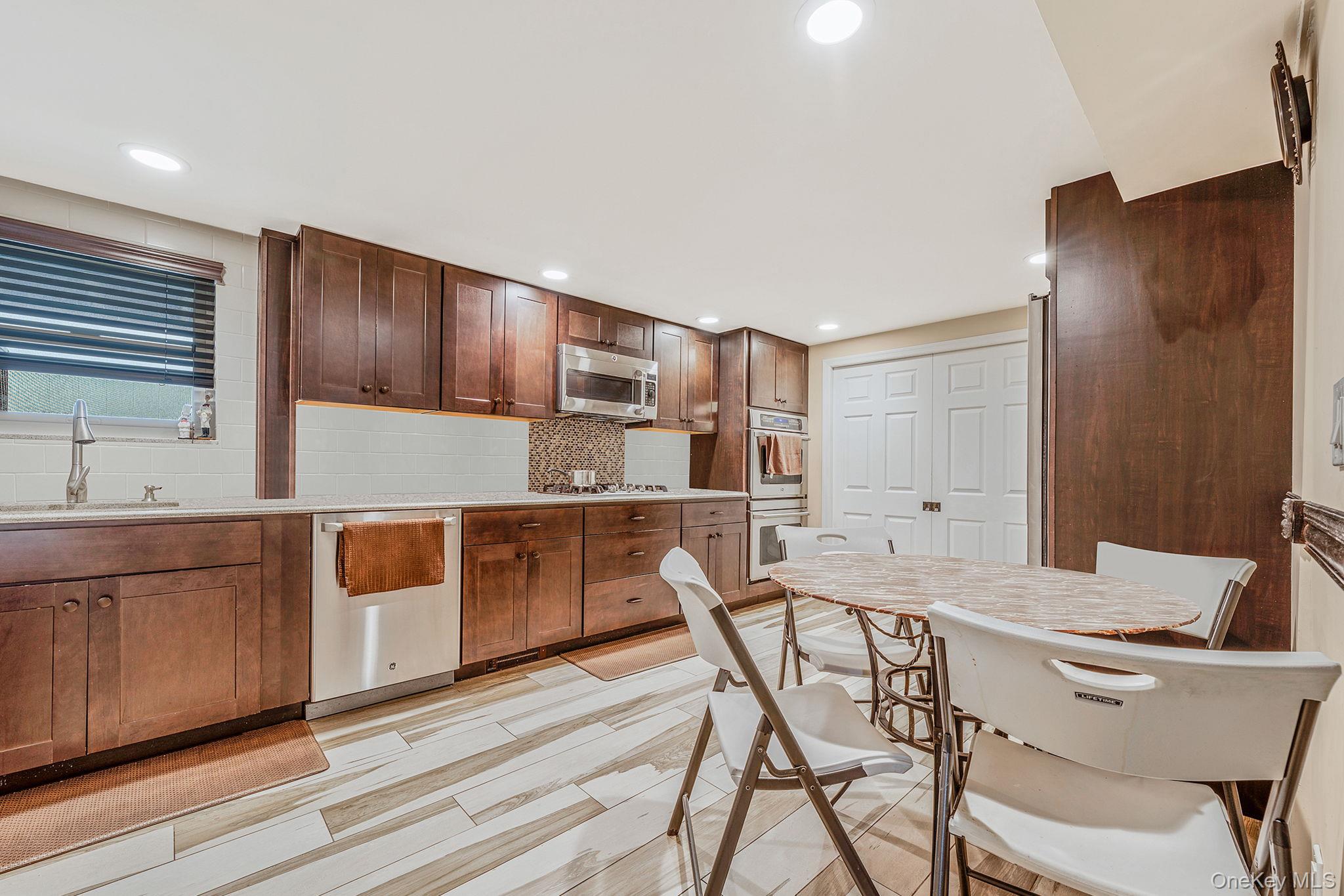 73 Elaine Drive, Oceanside, NY 11572