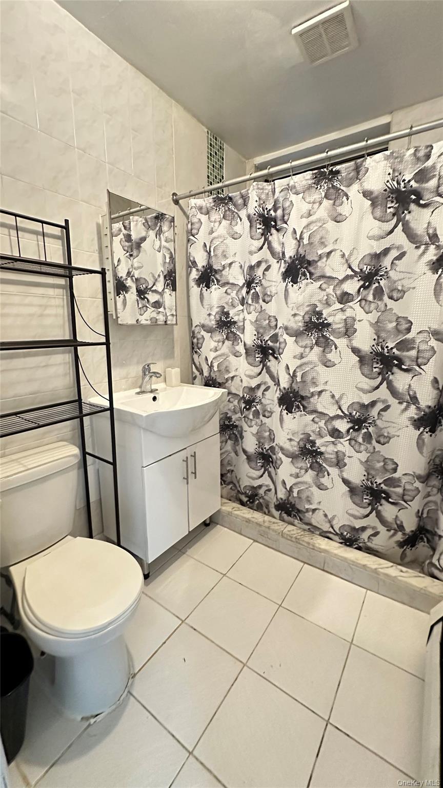 5006 65th Place, Woodside, NY 11377