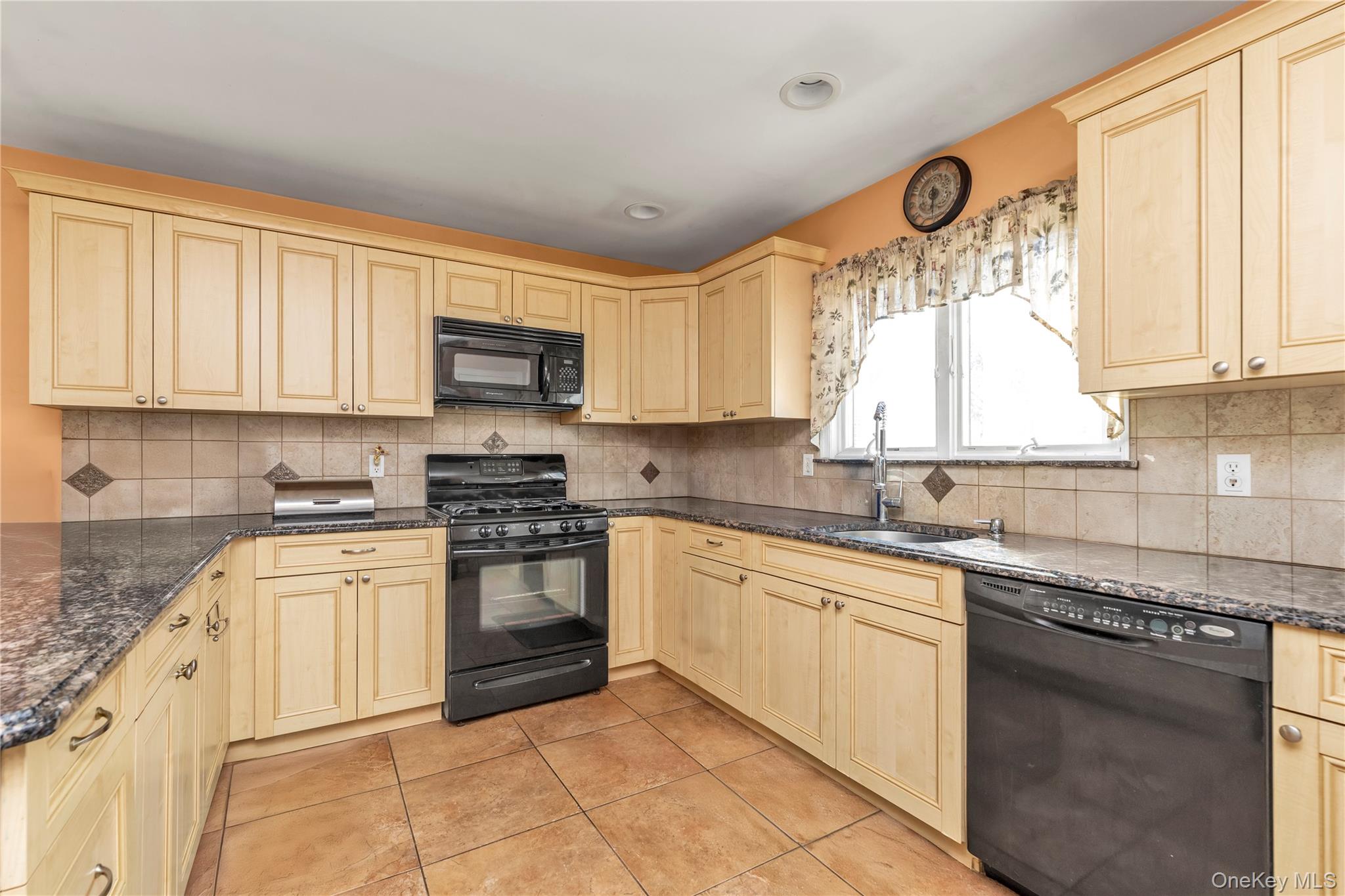 87 Montgomery Avenue, Oceanside, NY 11572