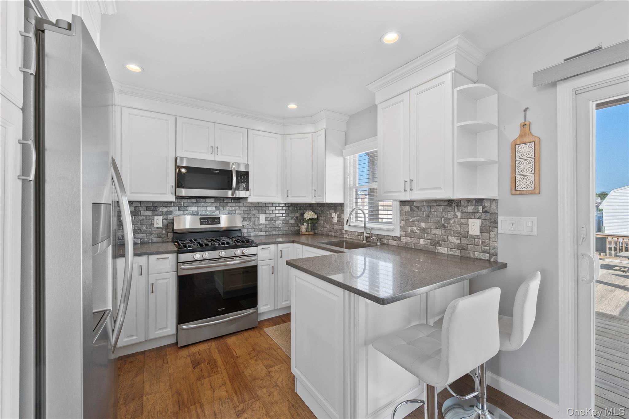 15 Hayes Road, Amity Harbor, NY 11701