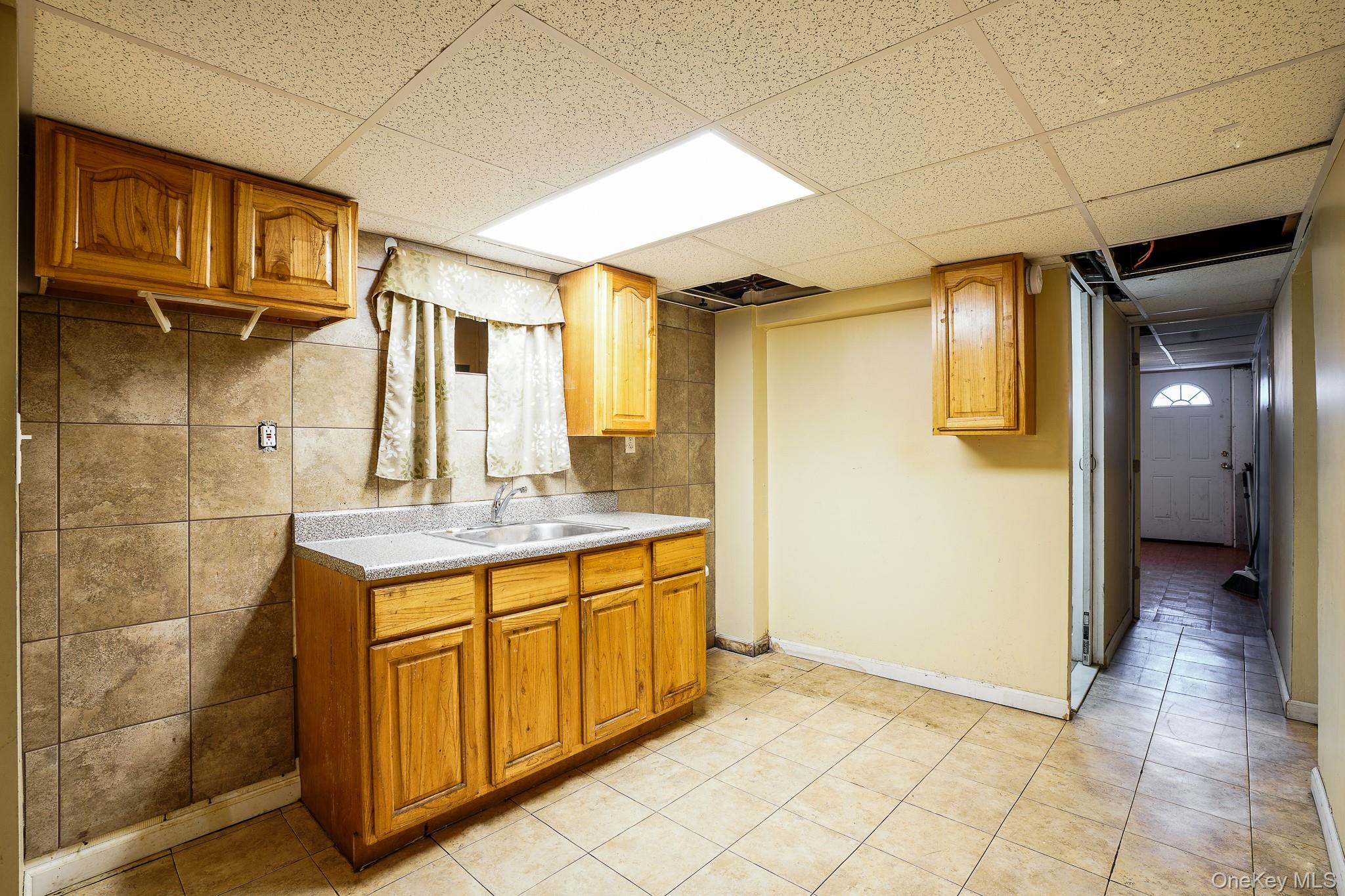 12808 Sutter Avenue, South Ozone Park, NY 11420