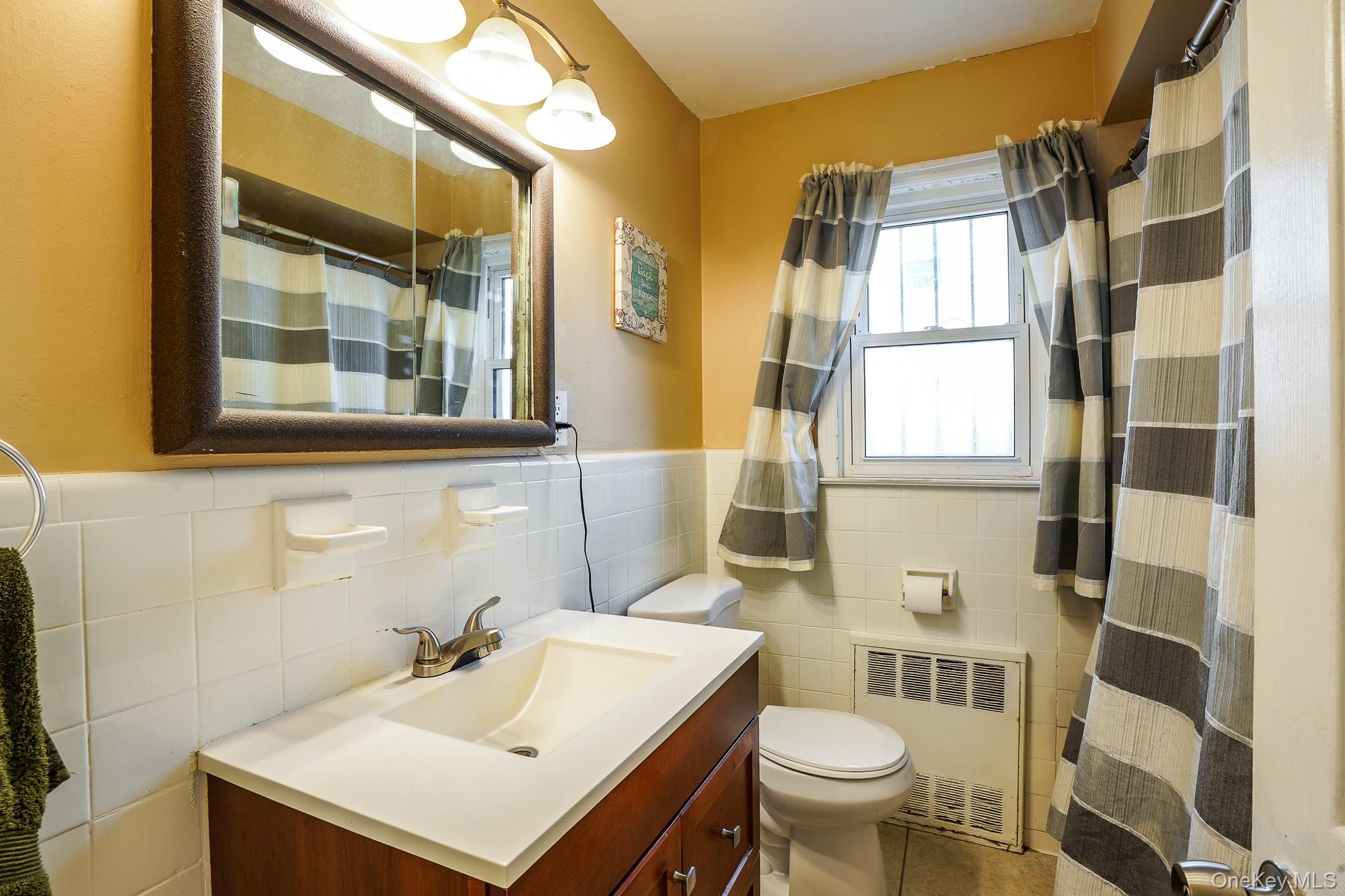 12808 Sutter Avenue, South Ozone Park, NY 11420