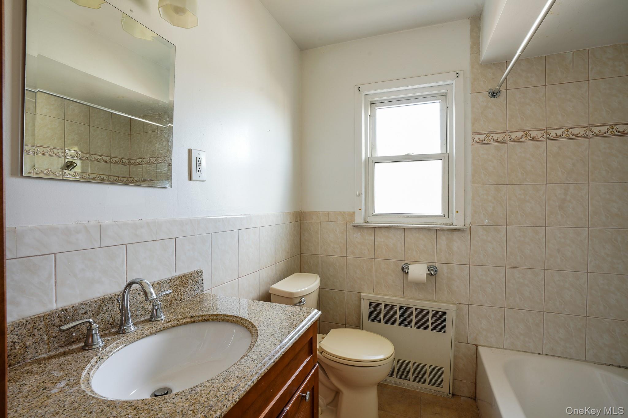 12808 Sutter Avenue, South Ozone Park, NY 11420