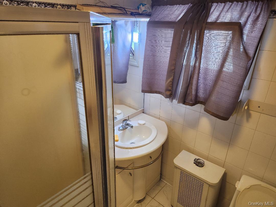 10 Sheridan Place, Roosevelt, NY 11575