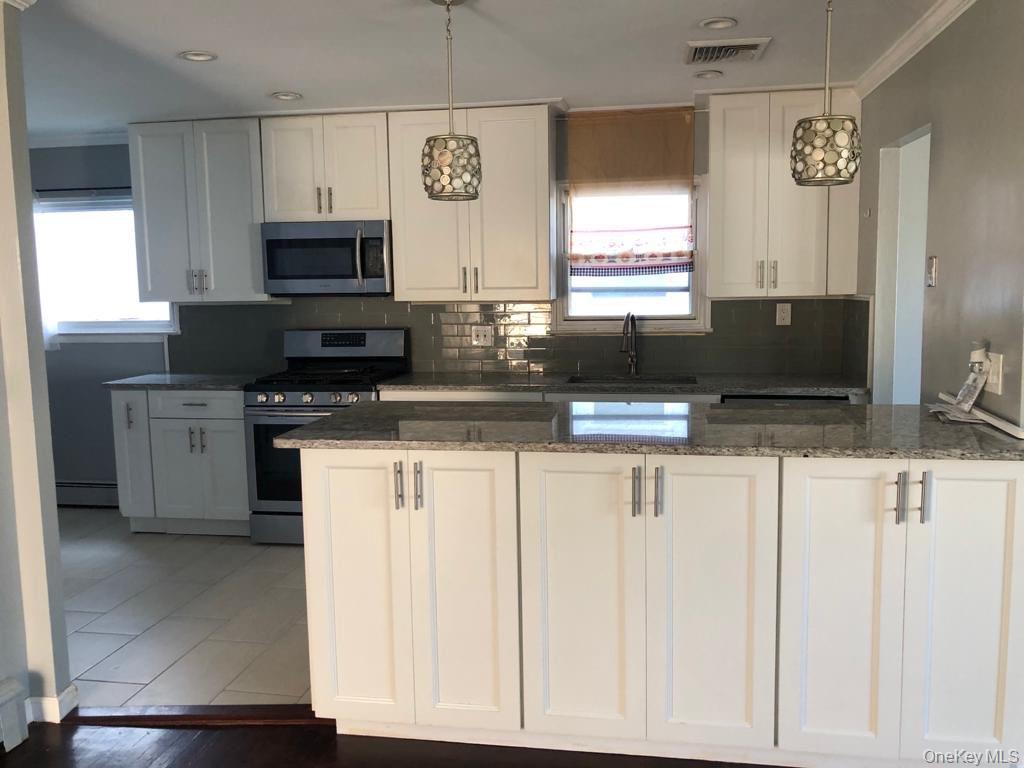 32-23 Plunkett Avenue, Far Rockaway, NY 11691