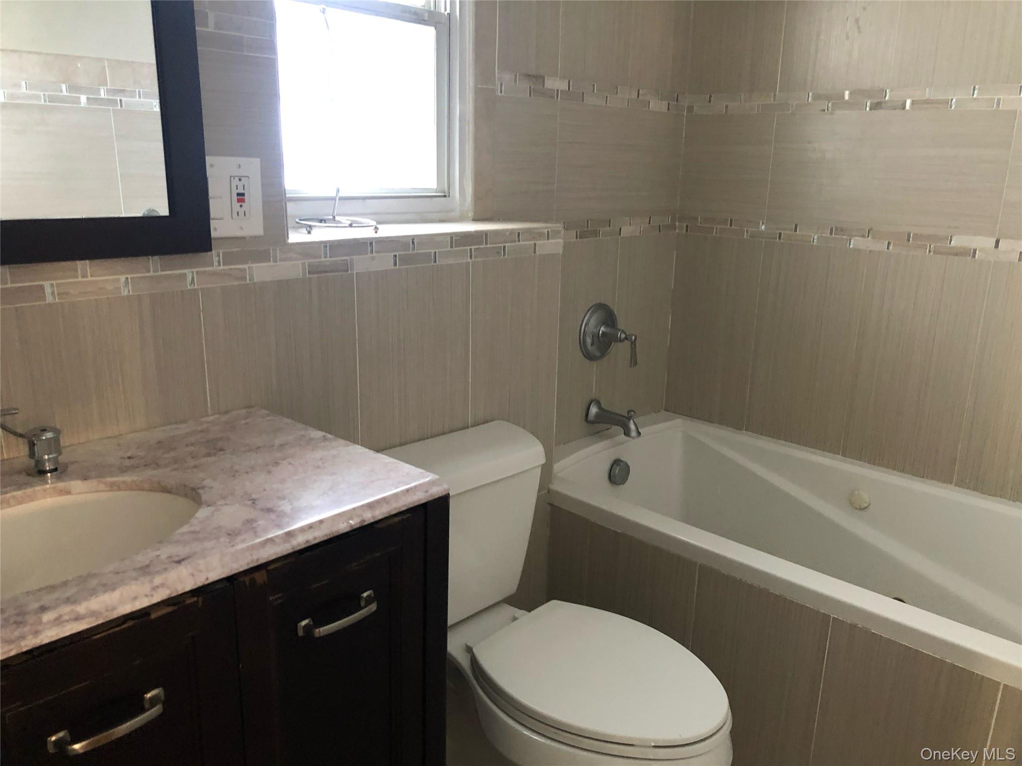 32-23 Plunkett Avenue, Far Rockaway, NY 11691