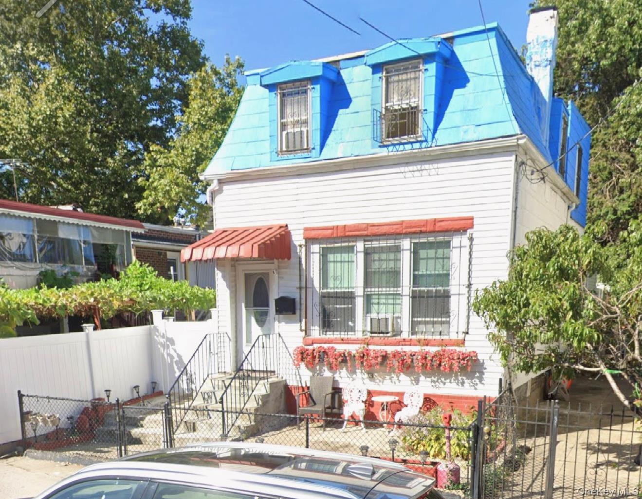 49-12 69th Street, Woodside, NY 11377