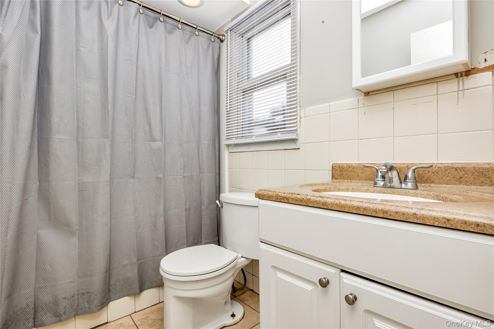 38 Woodmont Place, Farmingville, NY 11738