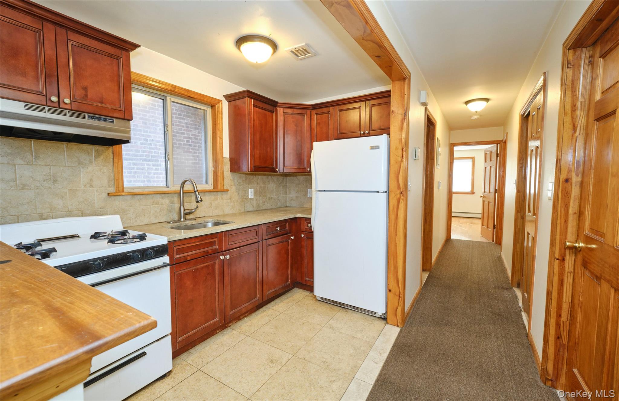 84-34 120 Street, Kew Gardens, NY 11415