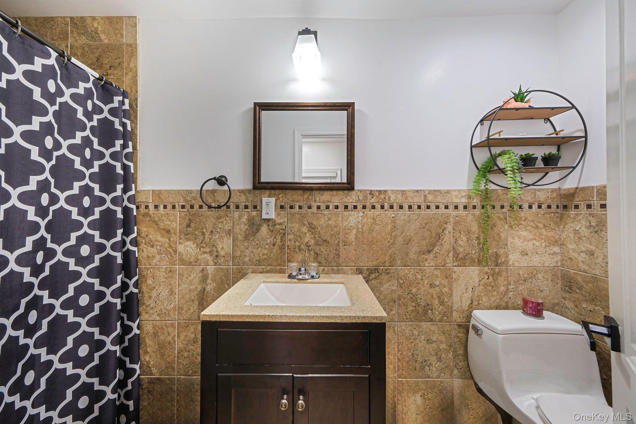 62 Bayside Avenue, Amity Harbor, NY 11701