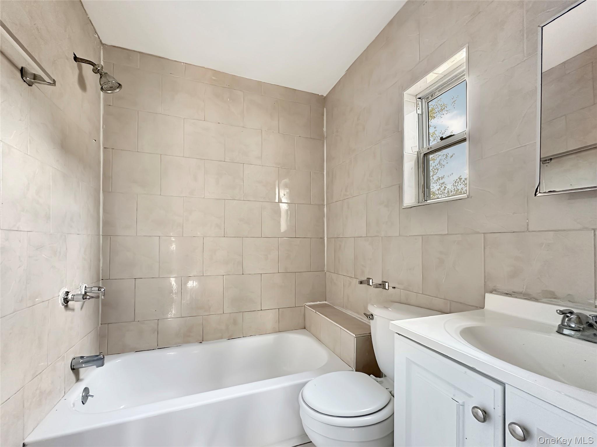 91 Elzey Avenue, Elmont, NY 11003