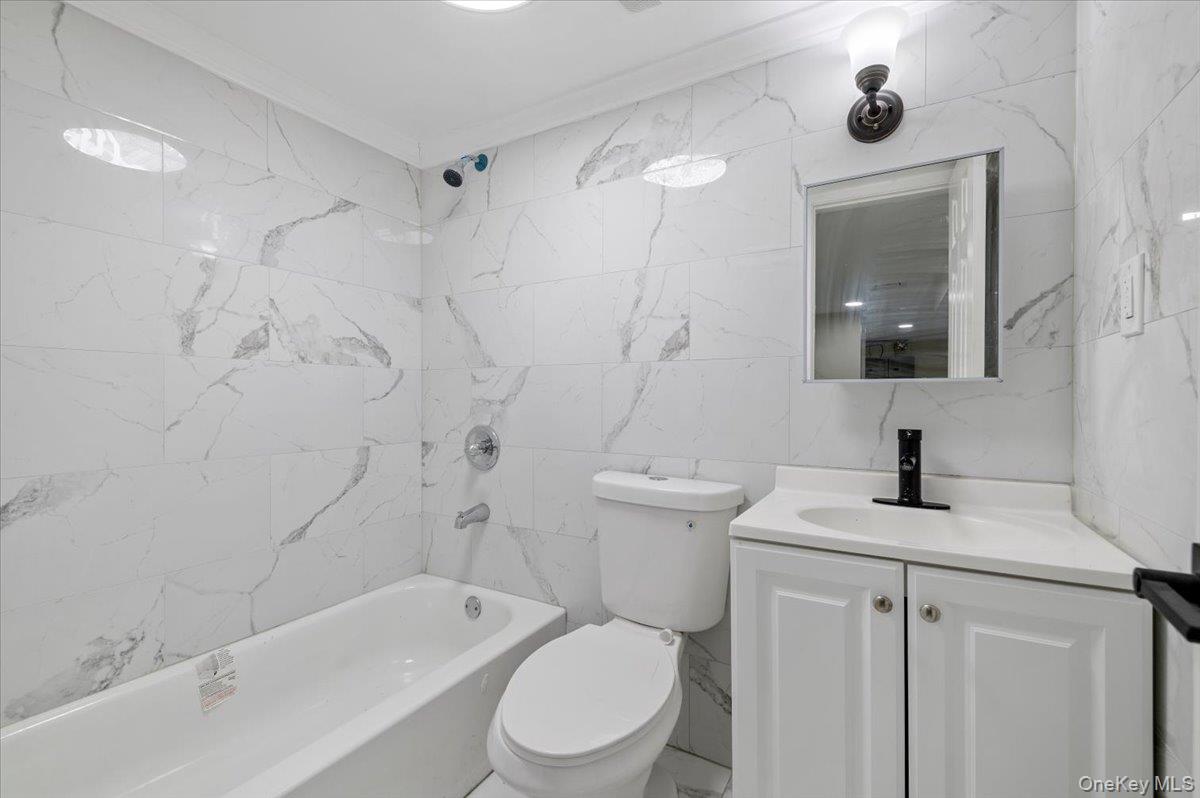 147- 26 240th Street, Rosedale, NY 11422