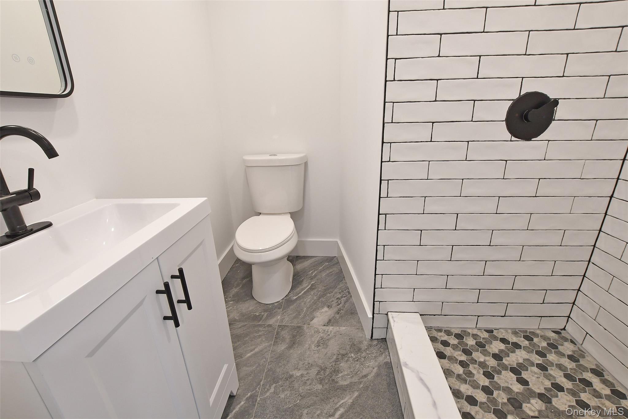 15 Spurwoods Lane, Farmingville, NY 11738