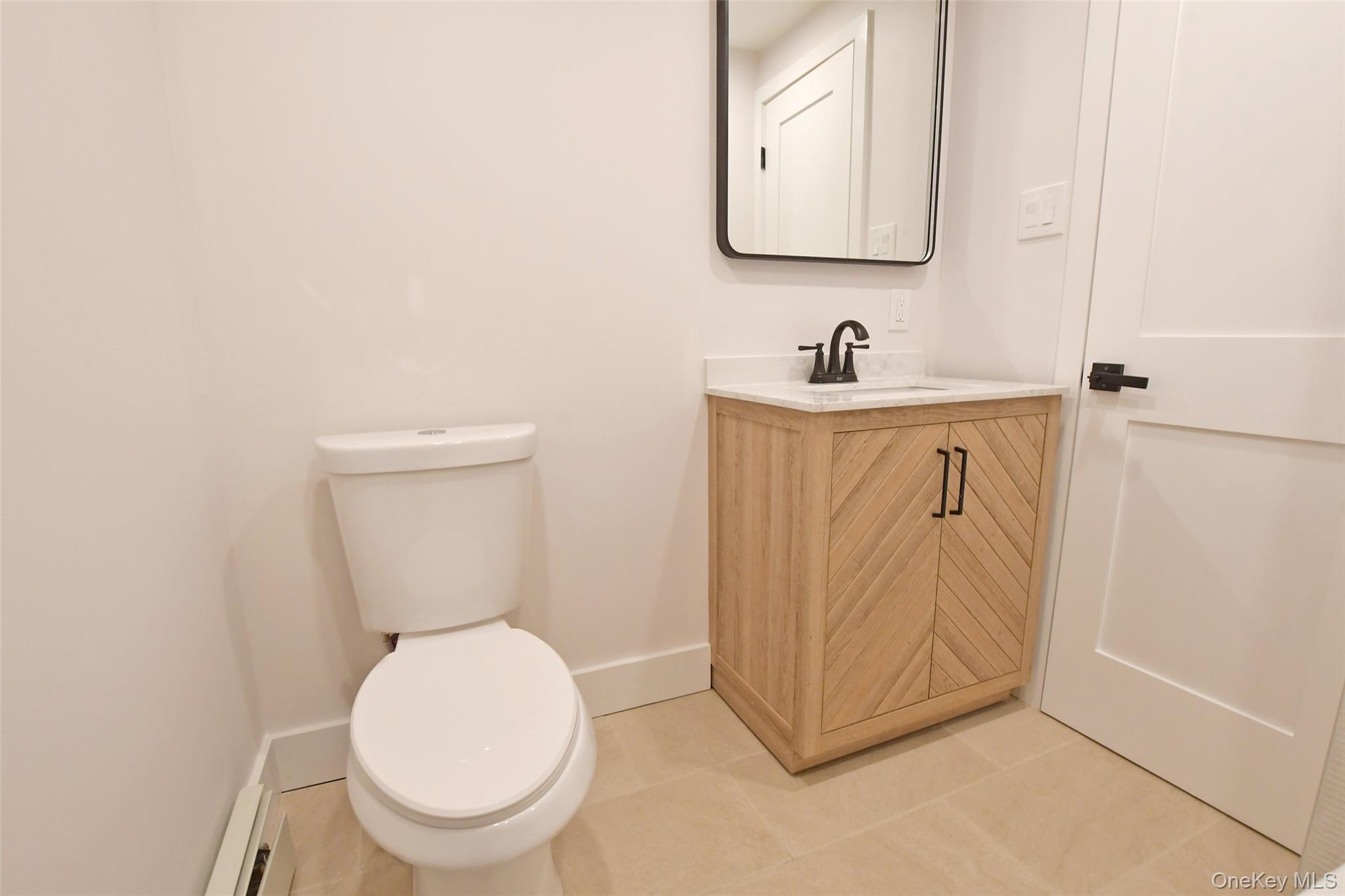 15 Spurwoods Lane, Farmingville, NY 11738