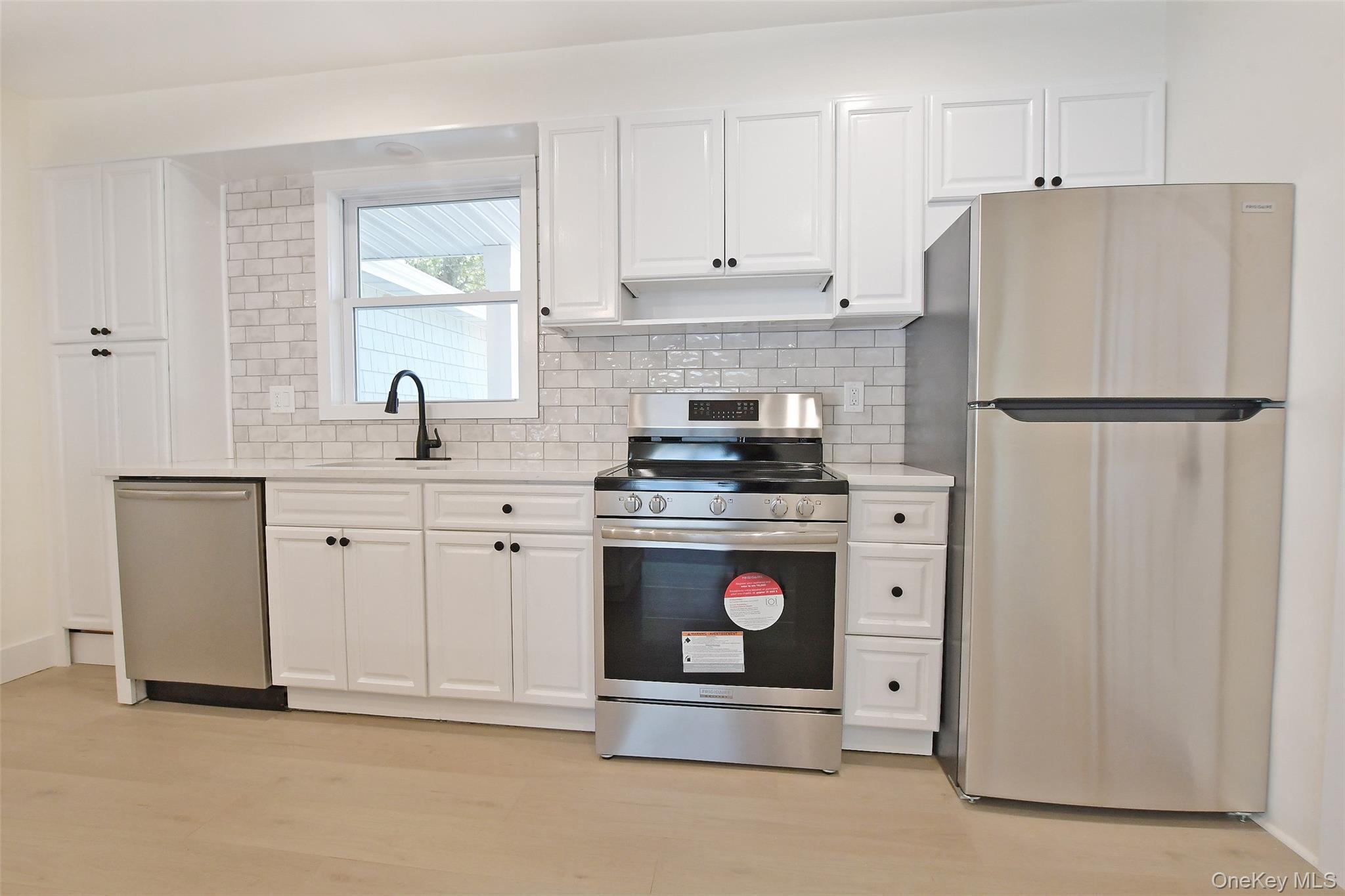 15 Spurwoods Lane, Farmingville, NY 11738