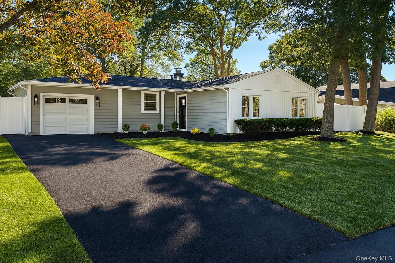 15 Spurwoods Lane, Farmingville, NY 11738