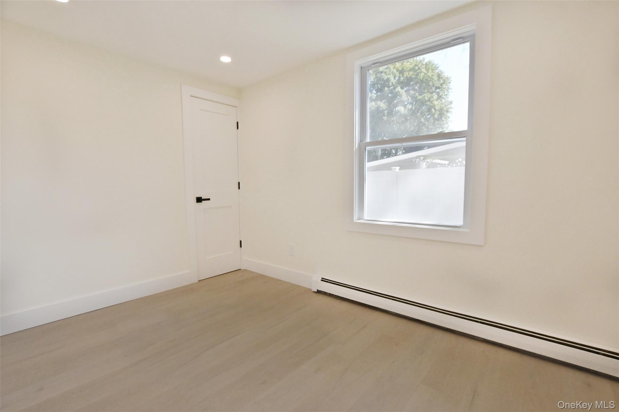 15 Spurwoods Lane, Farmingville, NY 11738