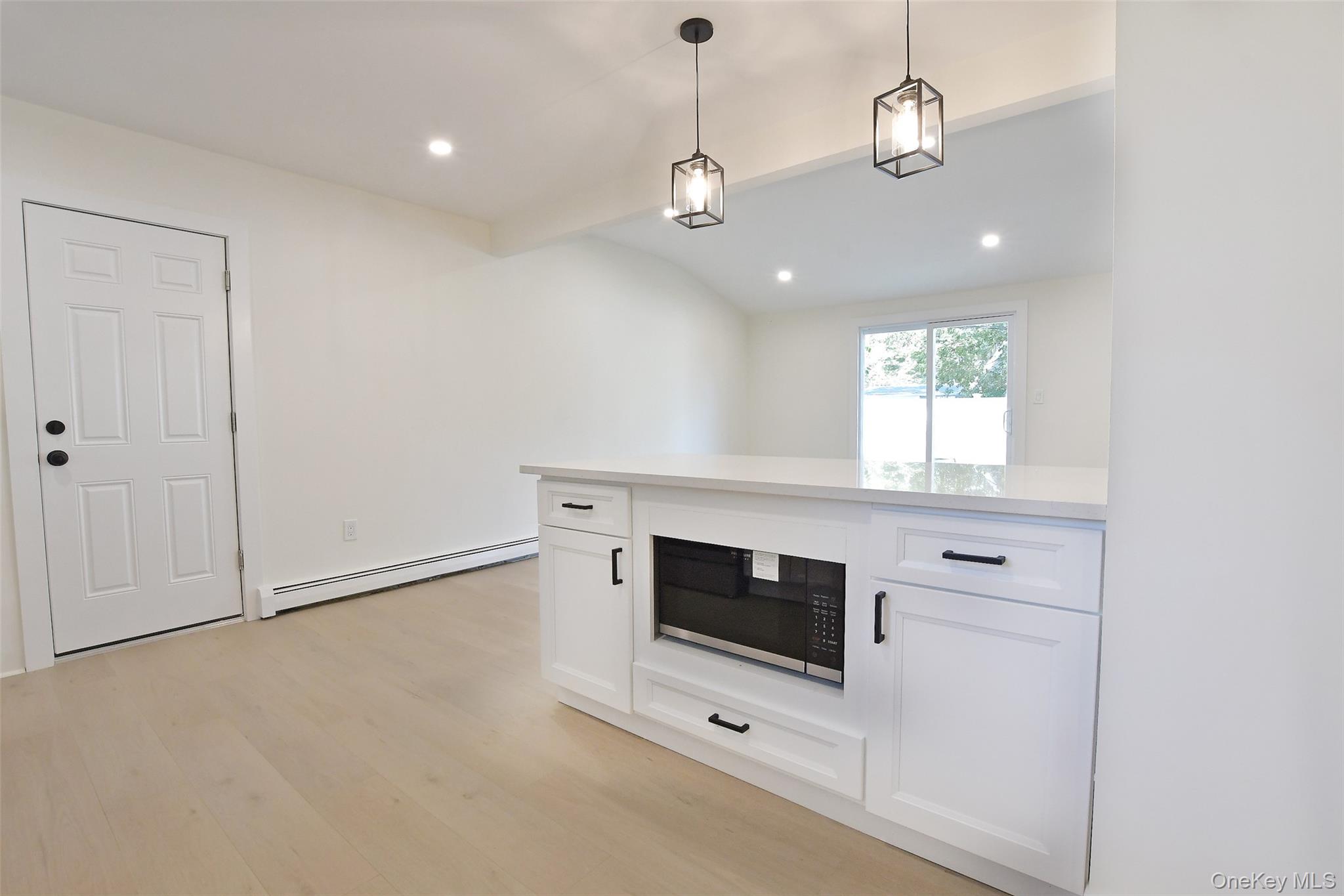 15 Spurwoods Lane, Farmingville, NY 11738