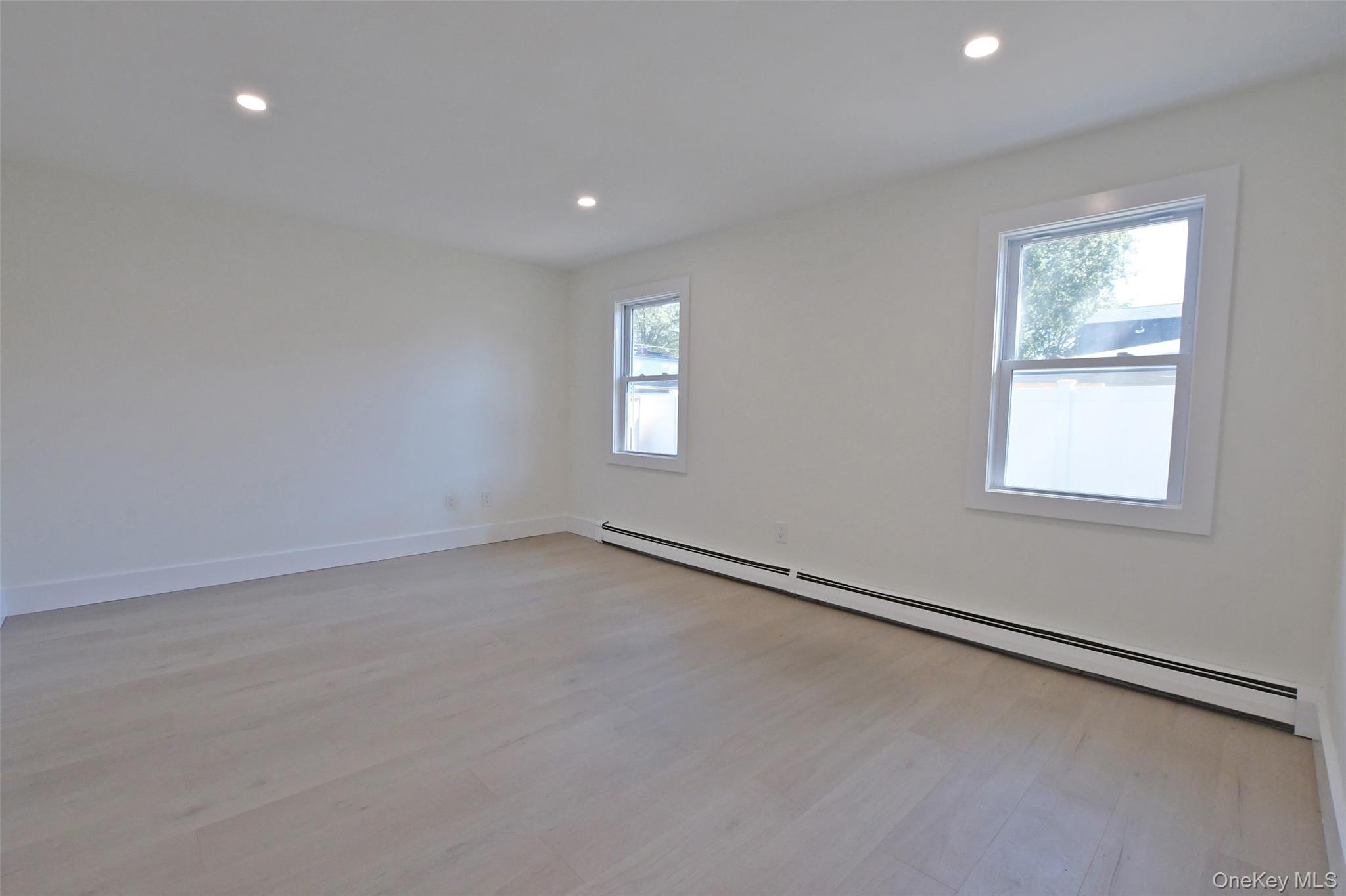 15 Spurwoods Lane, Farmingville, NY 11738