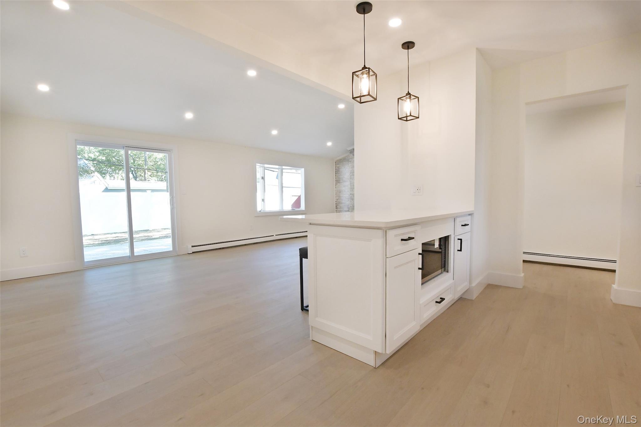 15 Spurwoods Lane, Farmingville, NY 11738