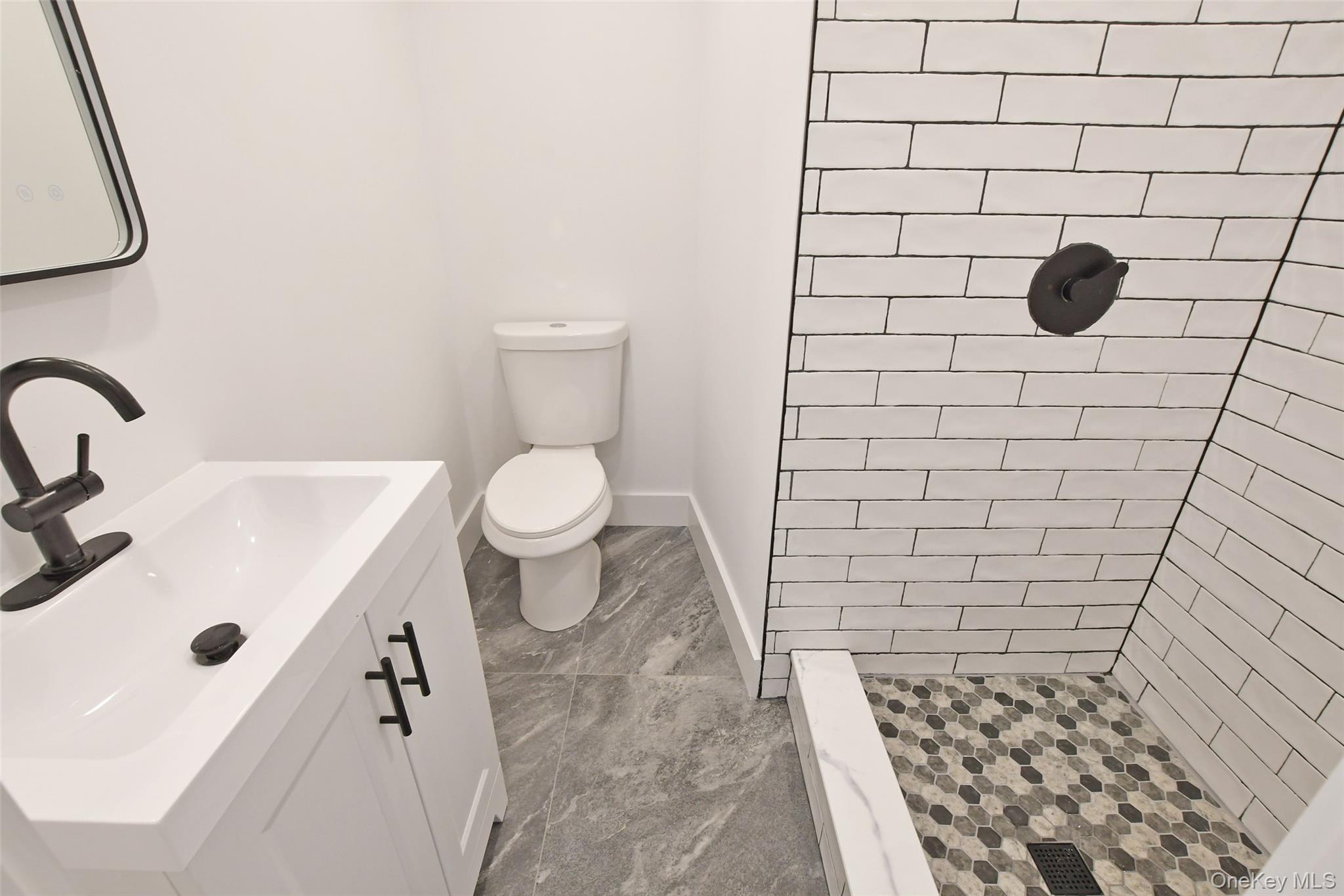 15 Spurwoods Lane, Farmingville, NY 11738