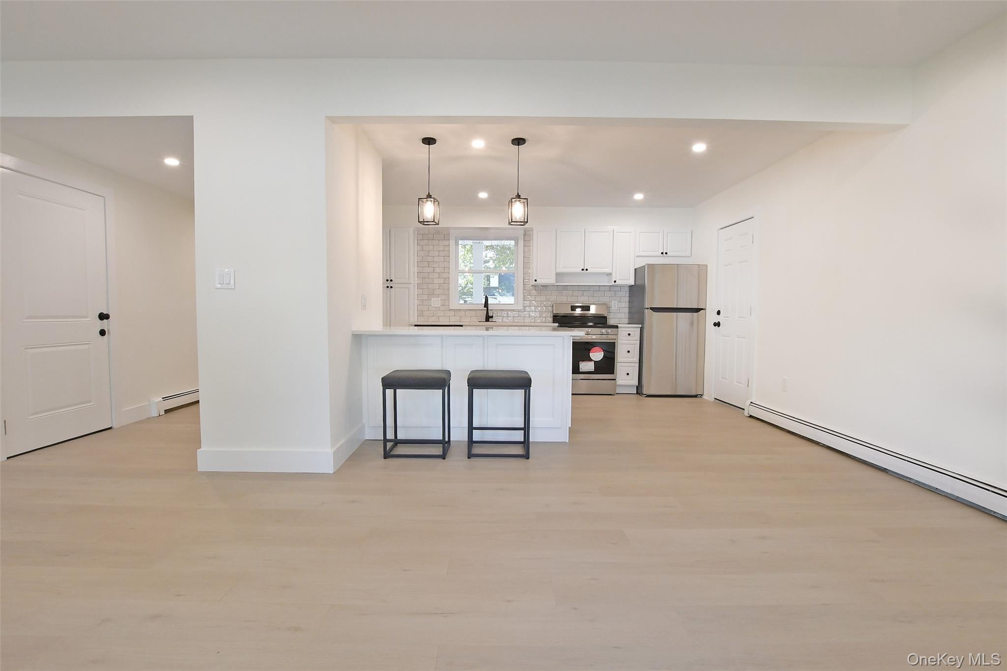 15 Spurwoods Lane, Farmingville, NY 11738