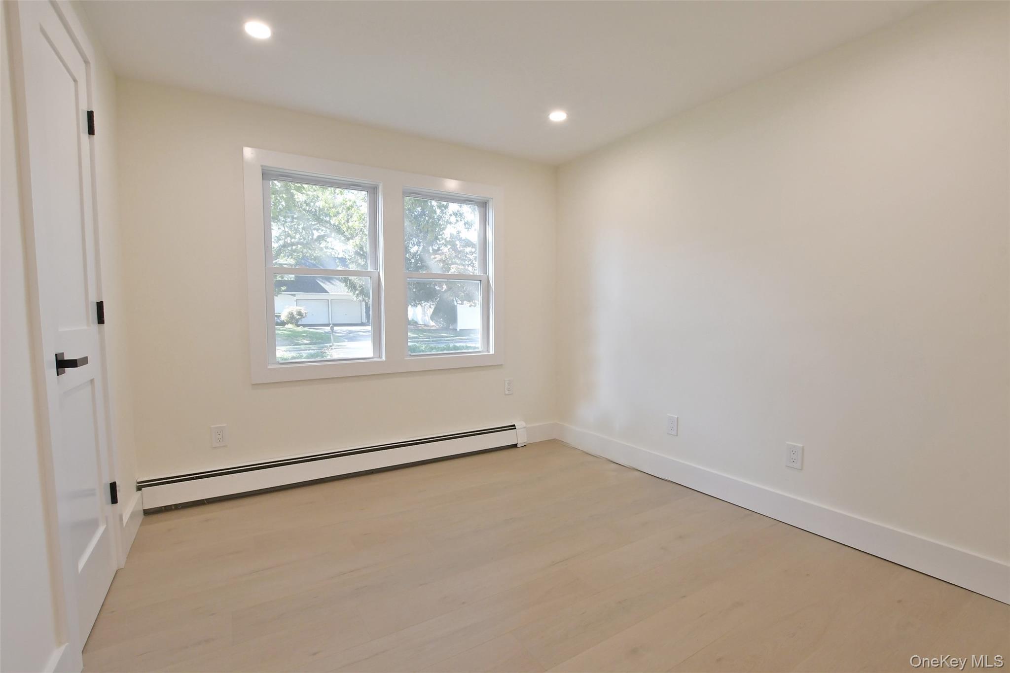 15 Spurwoods Lane, Farmingville, NY 11738