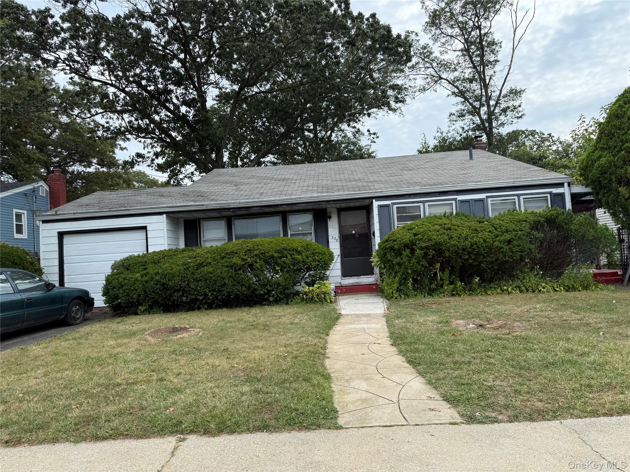 338 E Clinton Avenue, Roosevelt, NY 11575