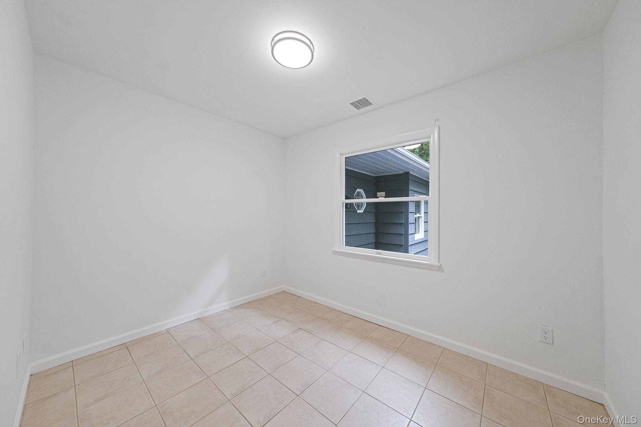 11 Wildwood Road, Ridge, NY 11961