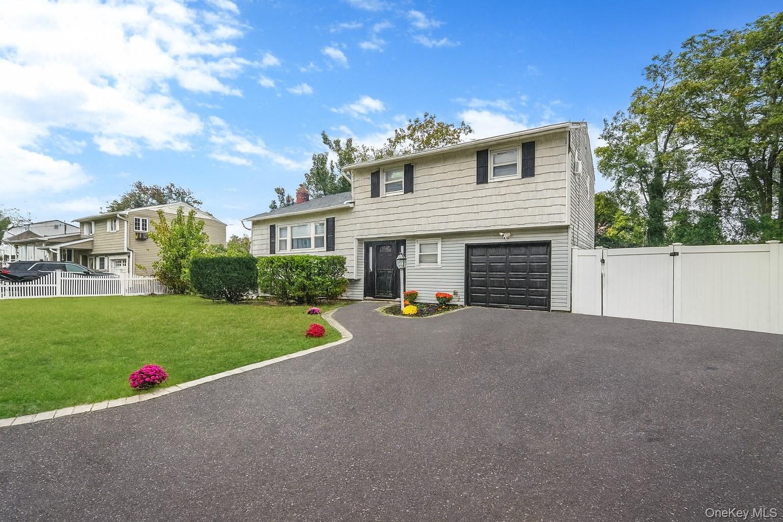 23 Holiday Park Drive, Centereach, NY 11720