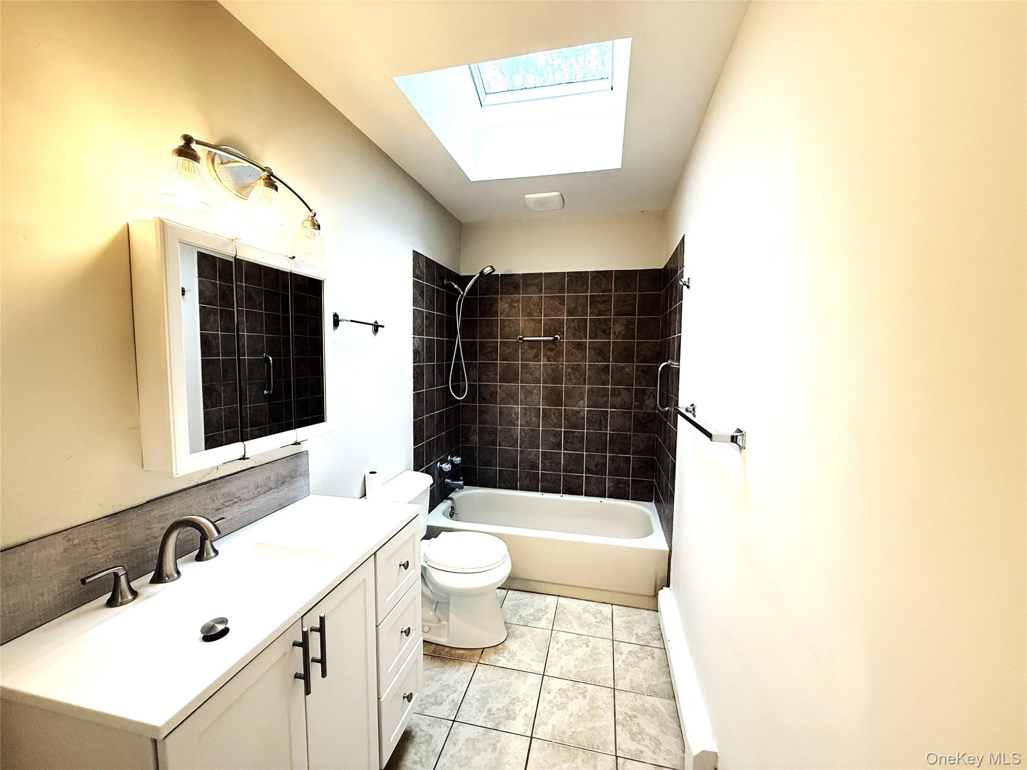 307 S Bicycle Path, Farmingville, NY 11738