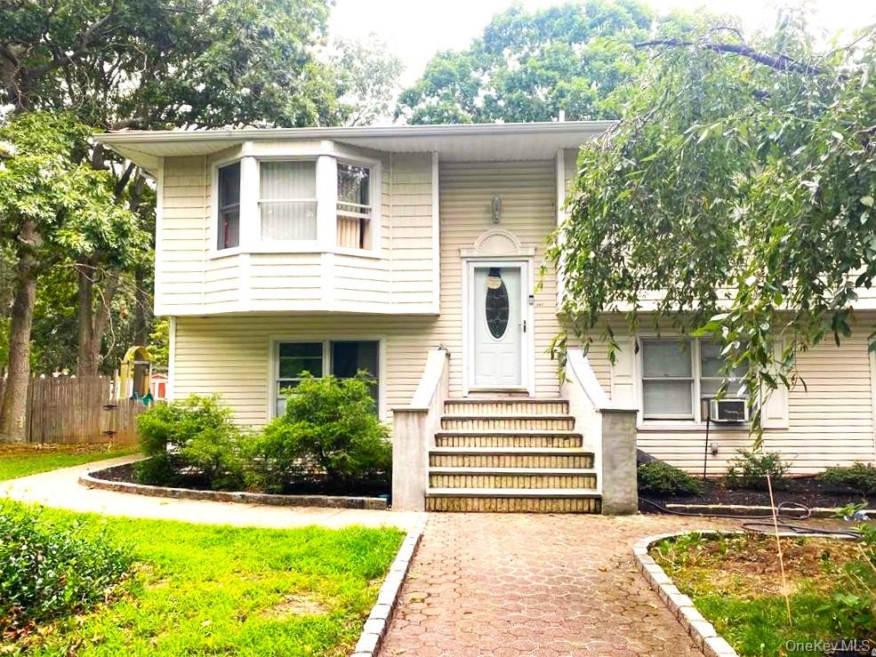 307 S Bicycle Path, Farmingville, NY 11738