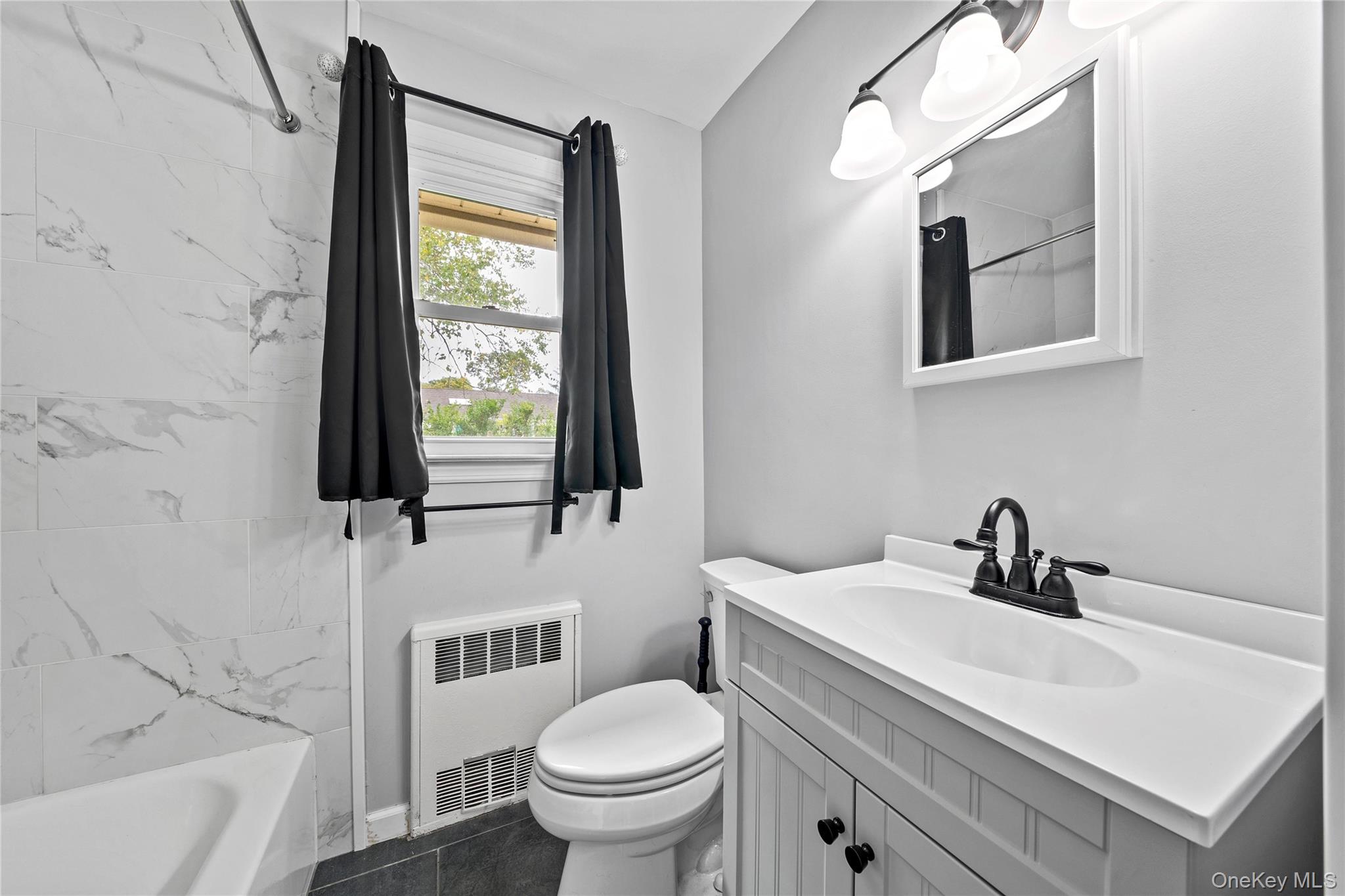 32 Phelps Lane, North Babylon, NY 11703