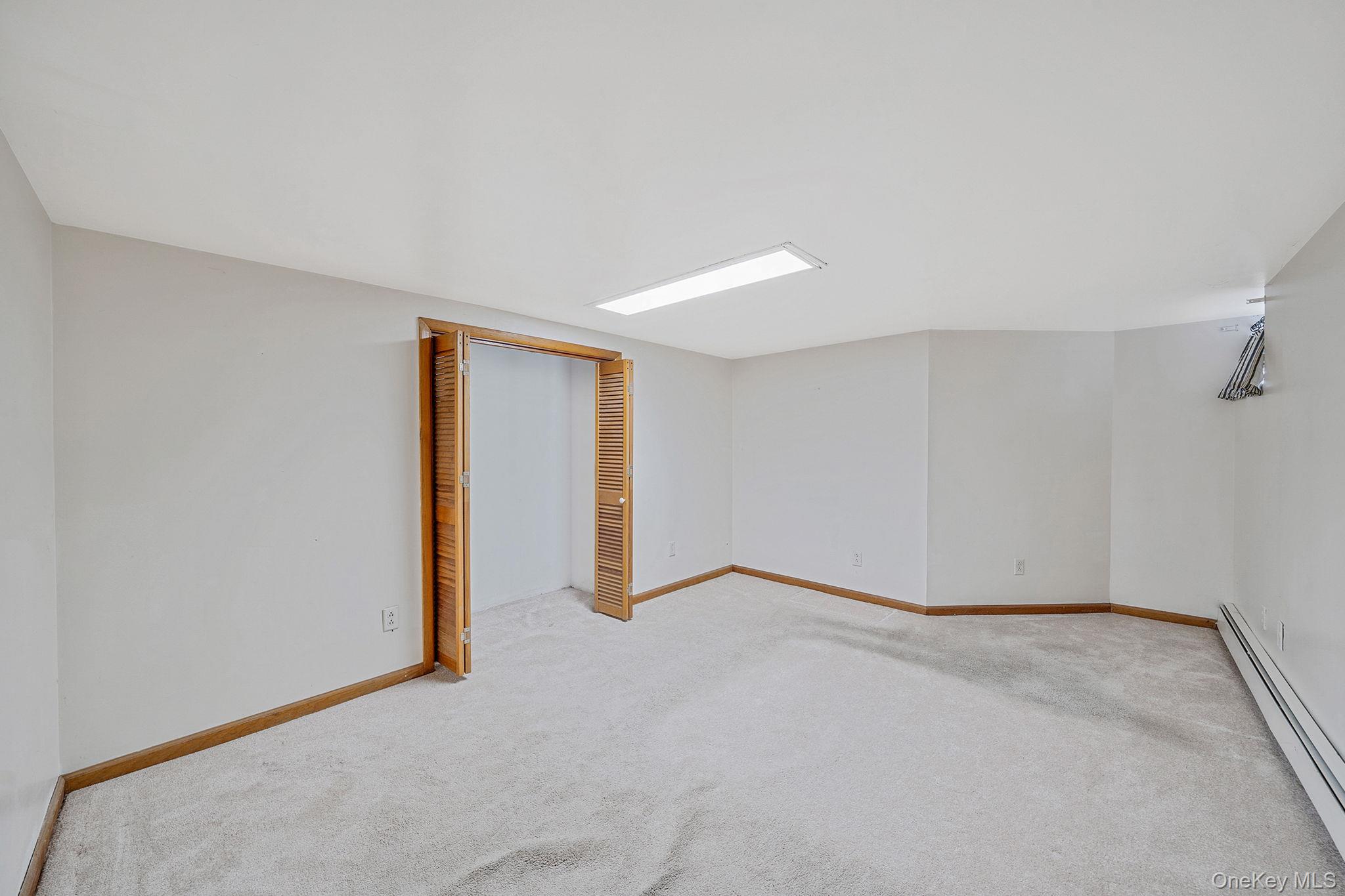 15 Raymond Avenue, Farmingville, NY 11738