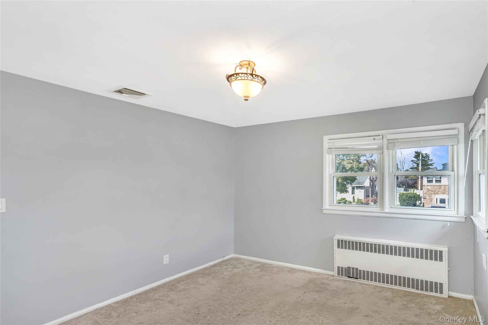 15 Ingram Drive, Hicksville, NY 11801