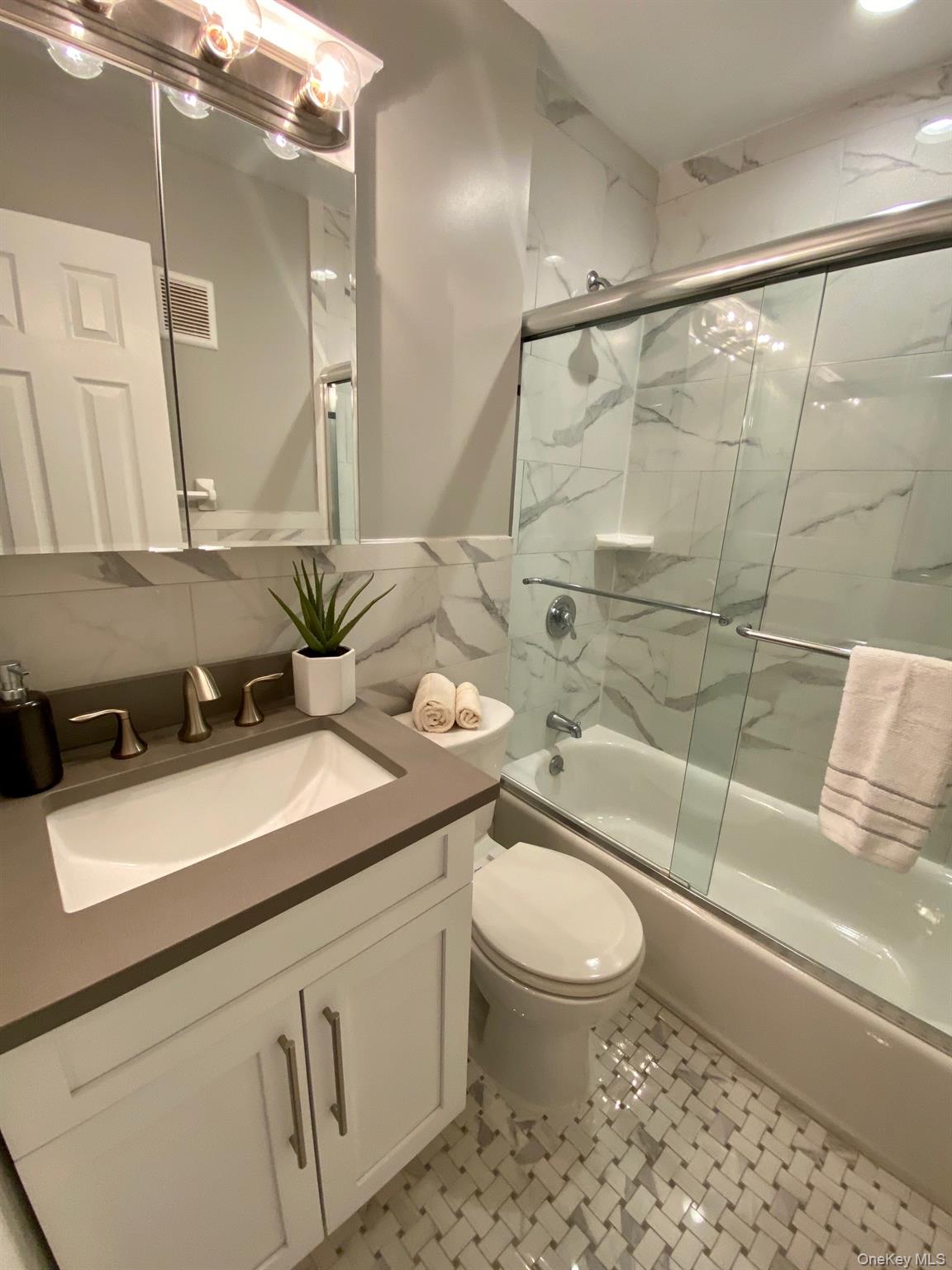 65 Westwood Drive # 100, Westbury, NY 11590