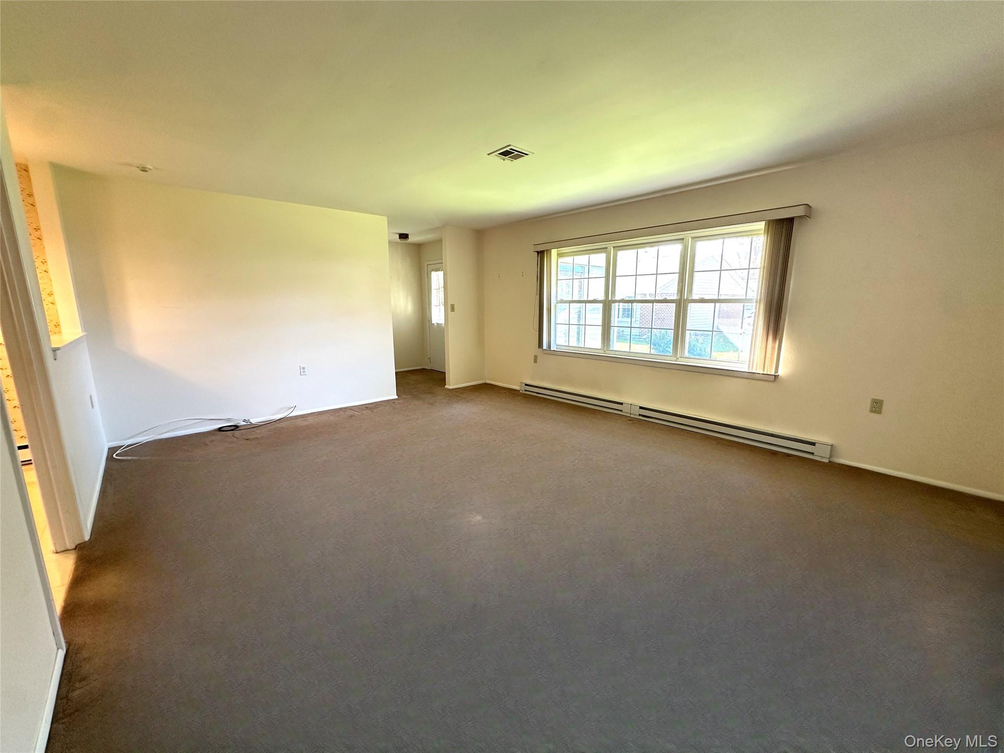 215 Woodbridge Drive # A, Ridge, NY 11961