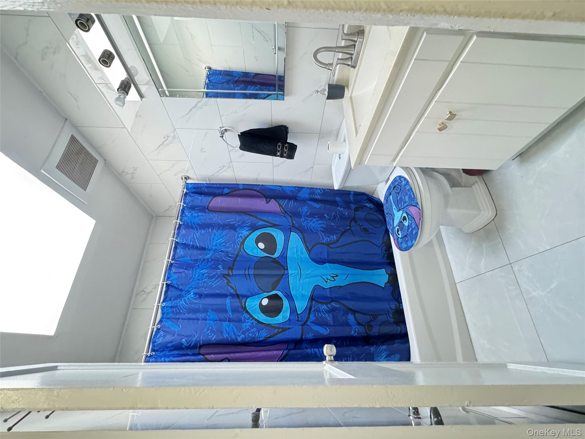 44-17 65TH Street, Woodside, NY 11377