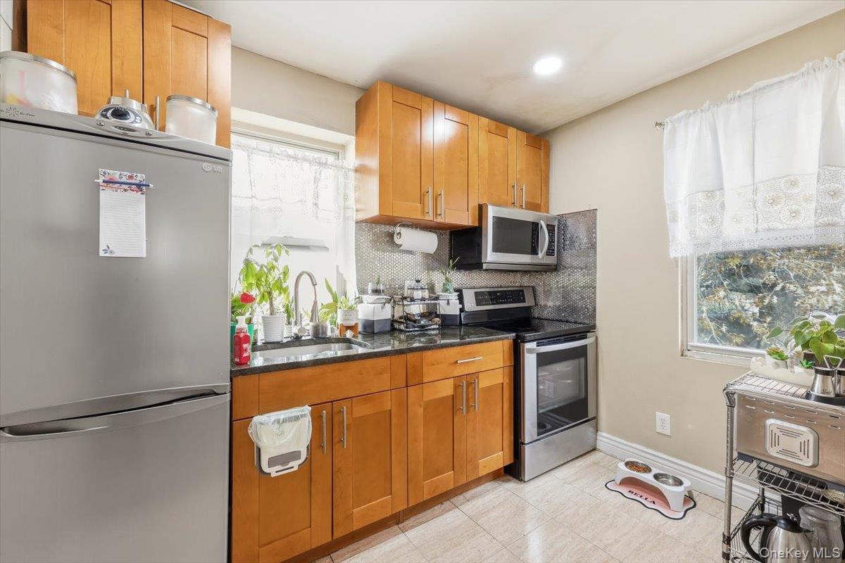 9413 87th Street, Ozone Park, NY 11416