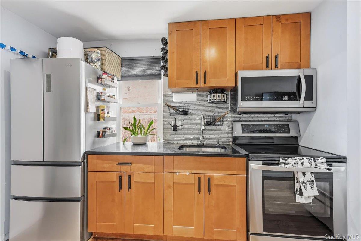 9413 87th Street, Ozone Park, NY 11416