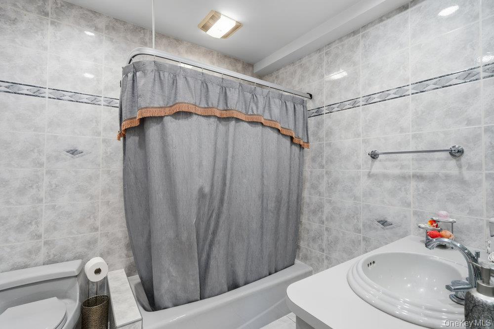 72 Lake End Road, Merrick, NY 11566