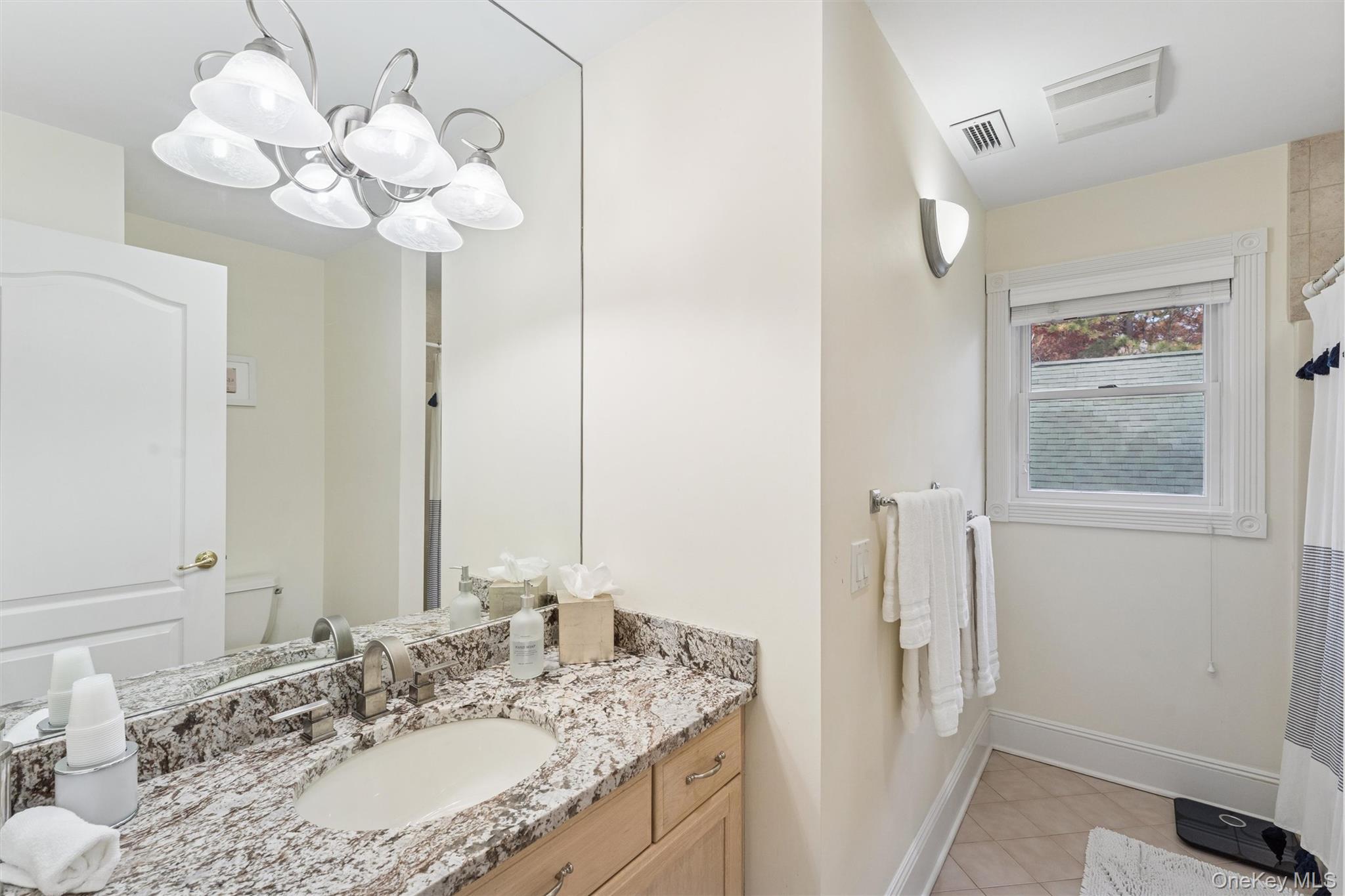 3 Cherry Blossom Lane, East Quogue, NY 11942